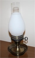 Brass bedside lamp with clear frosted shade
