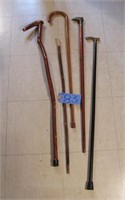 Lot of canes and walking sticks