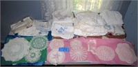 Large lot of handmade doilies, tablecloths,