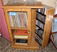 28" Oak stereo cabinet with over 100 CD's