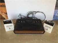 Atari gaming console with 3 remotes