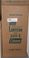 Coleman 220-E lantern & 4 cans of fuel