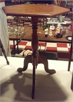 26" oak pedestal table with hexagon flip top