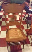 oak press back chair with caned seat