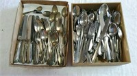 Two boxes of flatware