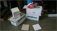 Three boxes tile with grout and adhesive
