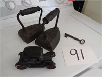 – Cast Iron Antique Car, 2 Smoothing Irons (#5’s)y