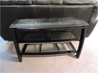 Heavy metal framed TV stand with glass shelves