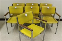 7 yellow arm chairs made by Howell