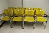 8 yellow arm chairs made by Howell