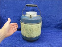 antique water jug with a stoneware liner