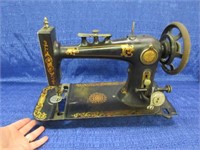 antique sewing machine - treadle type