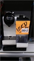 DeLonghi Nespresso machine (used) retails $342