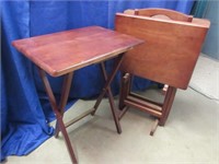 4 wooden tv trays on stand