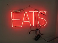 neon "EATS" sign - works