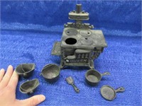 vintage miniture cast iron stove & items