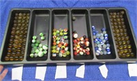 199 various marbles in plastic tray