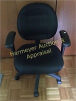 Office chair on rollers, arms, adjustable height