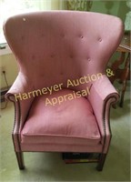 Curved back upholstery occasional chair