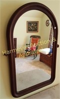 Walnut Framed hanging mirror, curved top