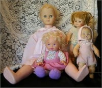 2 dolls w/ moveable eyes, 2 small dolls