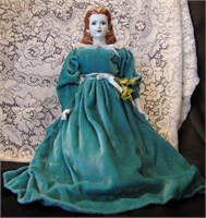 Porcelain Doll in aqua dress