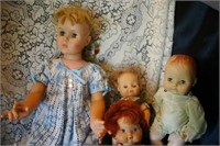 1 Large doll 3 medium size dolls