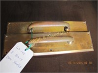2 brass door handles