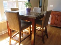 Table with four chairs, granite top
