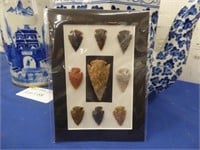 SMALL MATTED DISPLAY OF KNAPPED ARROWHEADS 9 TOTAL