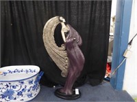 LARGE CERAMIC SCULPTURE OF A WOMAN IN LONG PURPLE