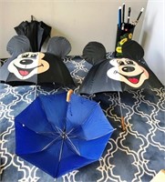 66-MICKEY MOUSE UMBRELLAS AND MORE