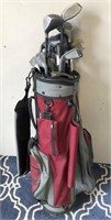 11-(RED) GOLF BAG AND MISC. GOLF CLUBS