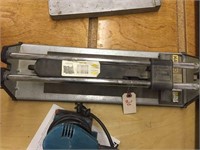 Group of items: NATTCO tile cutter, Makita
