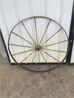 Large iron farm implement wheel