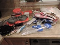 Storage containers, spatulas, knives, tea towels