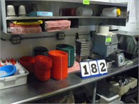 Contents of table and shelf, baskets, pans,