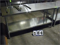 Stainless steel food prep table, 30 in by 72 in.