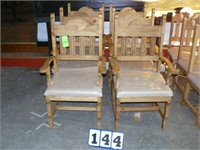 Rustic dining chairs with arms and cushions