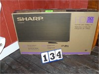 Sharp HD LED 1080p flat screen TV. UNUSED