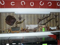 Contents of display. Assorted western decor items