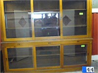 Counter high, glass and wooden display cases.