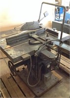 Moak industrial table saw.