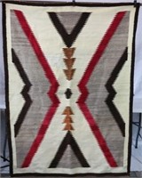 NAVAJO HOUR GLASS DESIGN RUG, CA 1940 WITH RED,