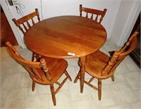 Drop leaf maple dining table with four chairs