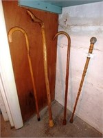 Four wooden canes