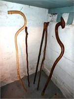 Five wooden canes