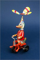 Toy: Vintage Tin Litho Wind Up German Duck On Bike