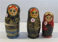 (3) Hand painted nesting dolls. All contain five