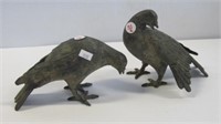 Pair of antique cast iron doves. Measures 5.5" h